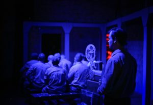 Cast of The Shawshank Redemption in a blue-lit night scene
