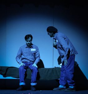 Andy and Red talk in a prison cell scene
